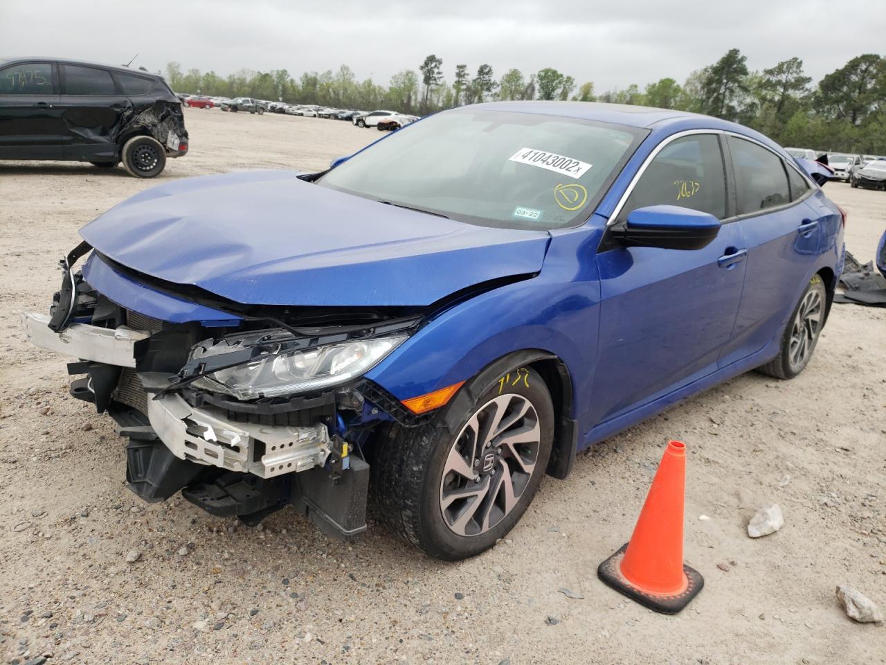 Photo 2 from auction – 2018 HONDA CIVIC EX with VIN 19XFC2F71JE010028