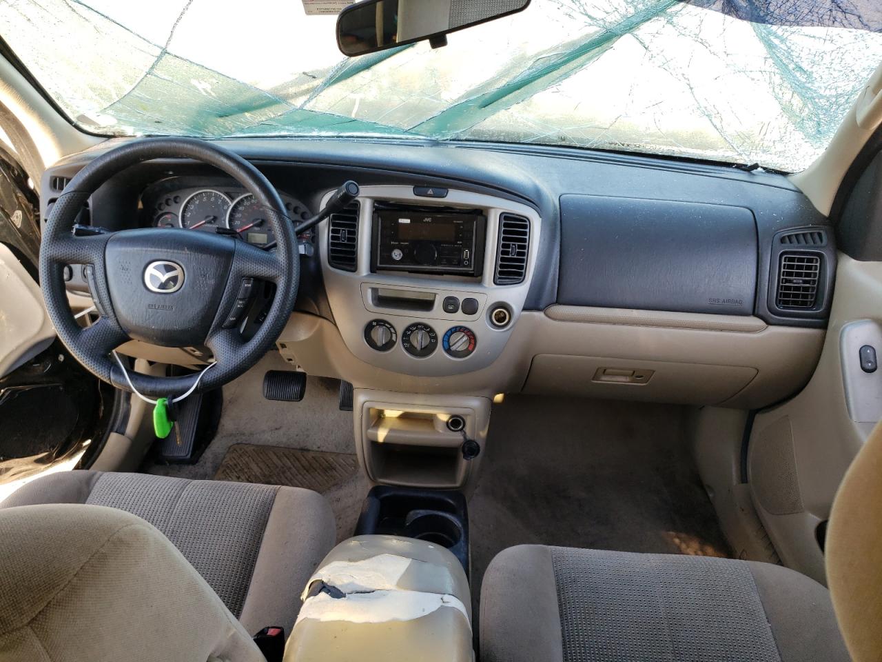 Photo 9 from auction – 2003 MAZDA TRIBUTE LX with VIN 4F2YZ04103KM46928