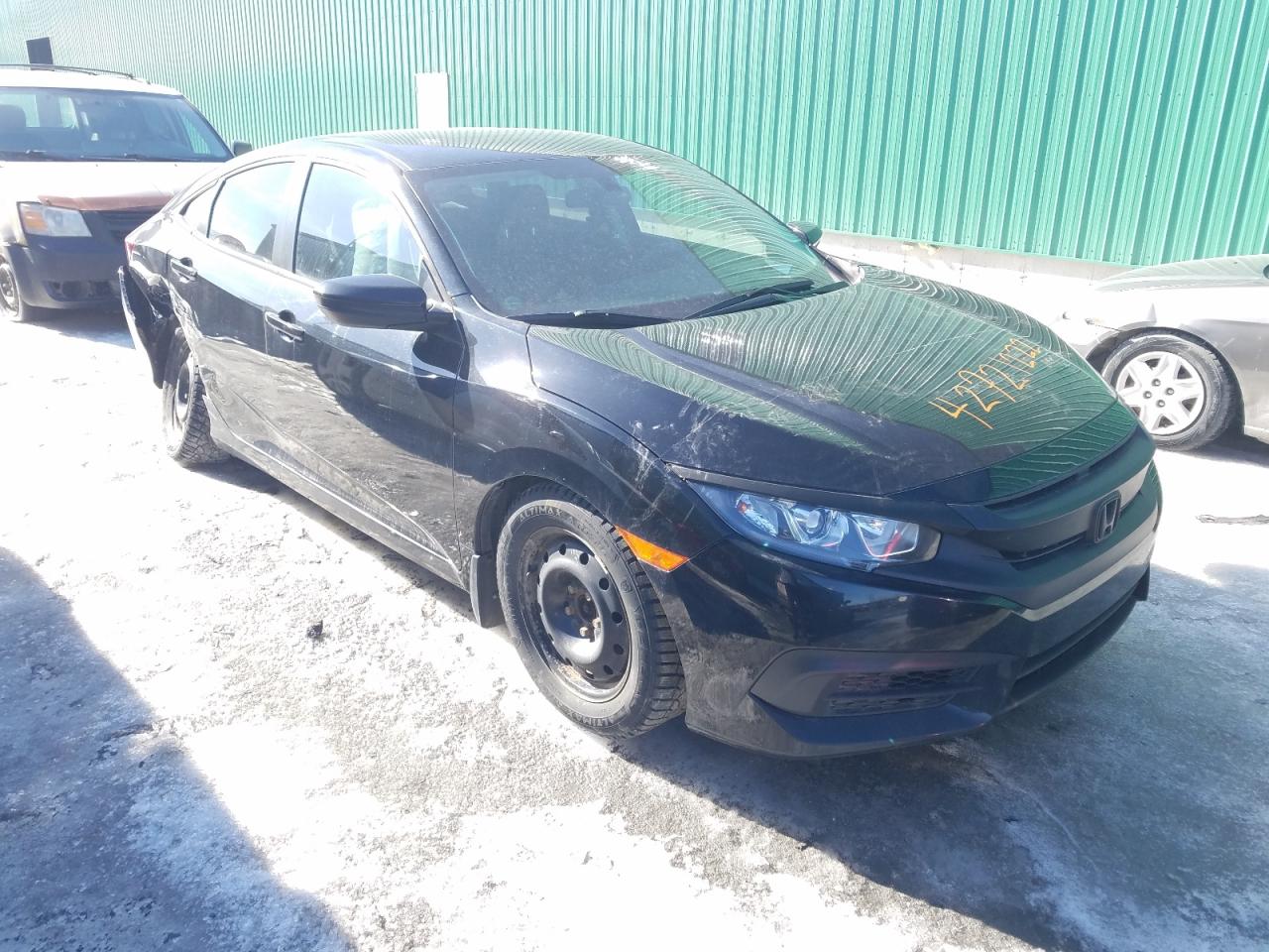 HONDA CIVIC LX 2017 with VIN 2HGFC2E5XHH007967 - Photo from auction