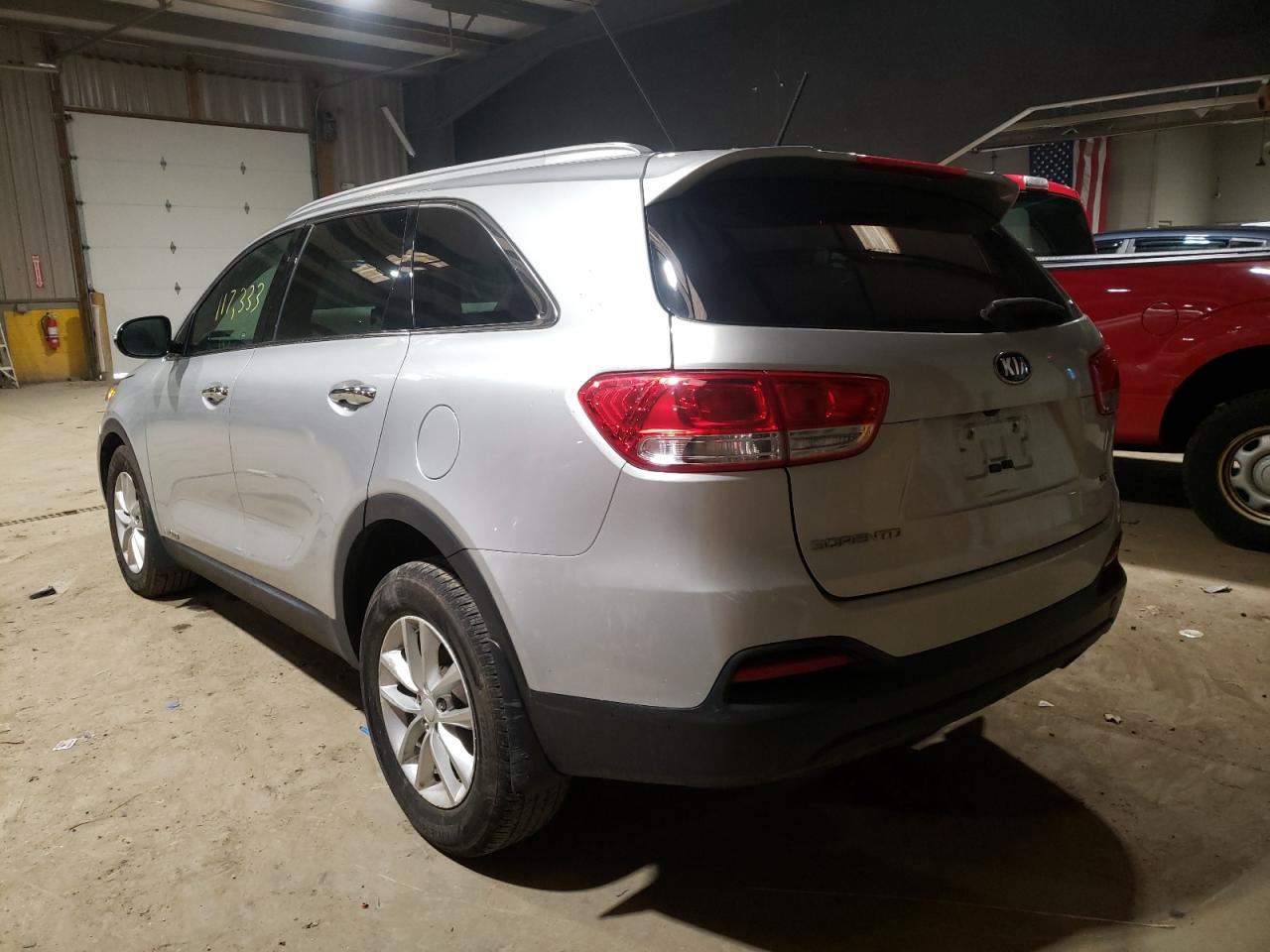 Photo 3 from auction – 2016 KIA SORENTO LX with VIN 5XYPGDA53GG104384