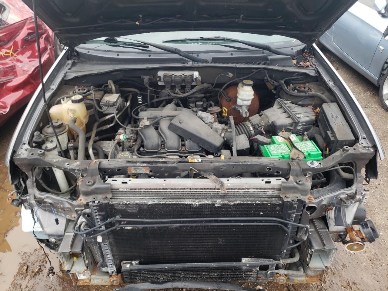 Photo 7 from auction – 2005 FORD ESCAPE LIM with VIN 1FMCU94105KA35640