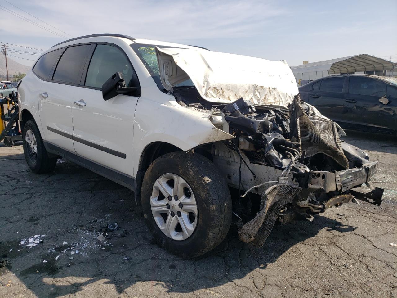 CHEVROLET TRAVERSE L 2015 with VIN 1GNKRFED4FJ300664 - Photo from auction