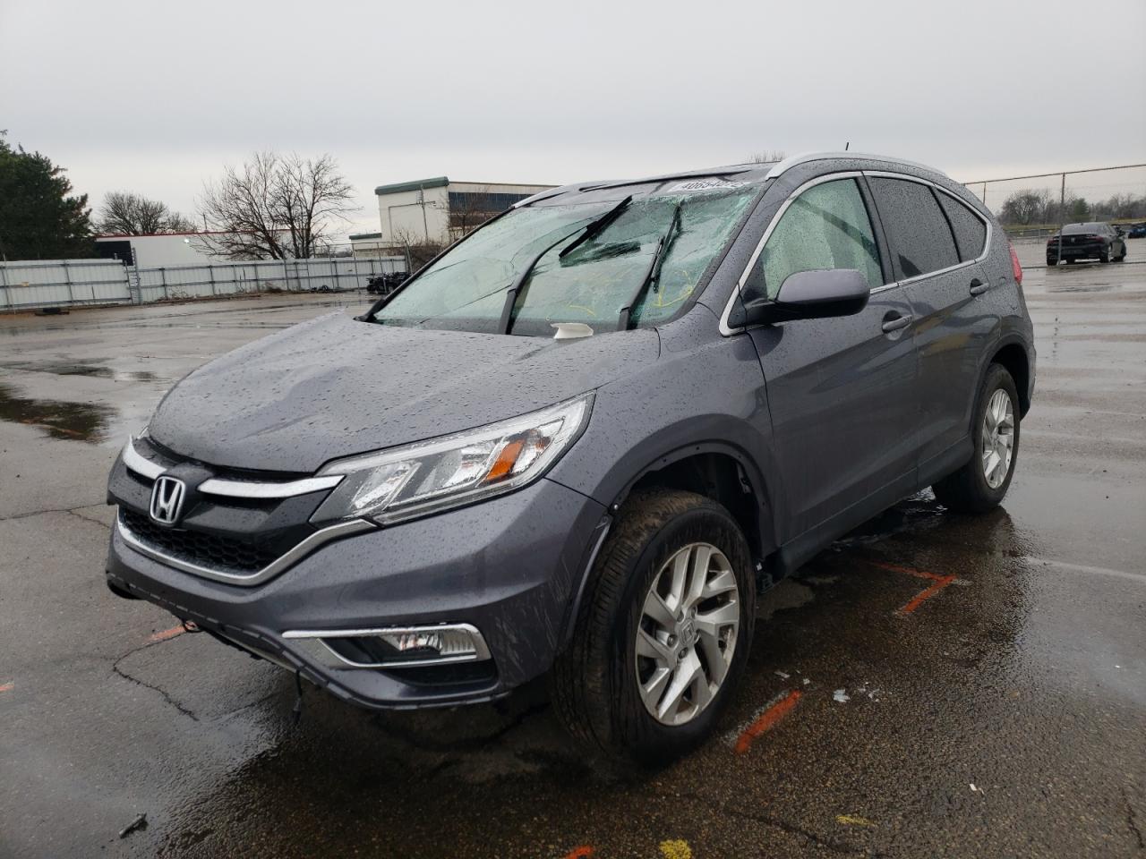 Photo 2 from auction – 2016 HONDA CR-V EXL with VIN 2HKRM4H70GH726359