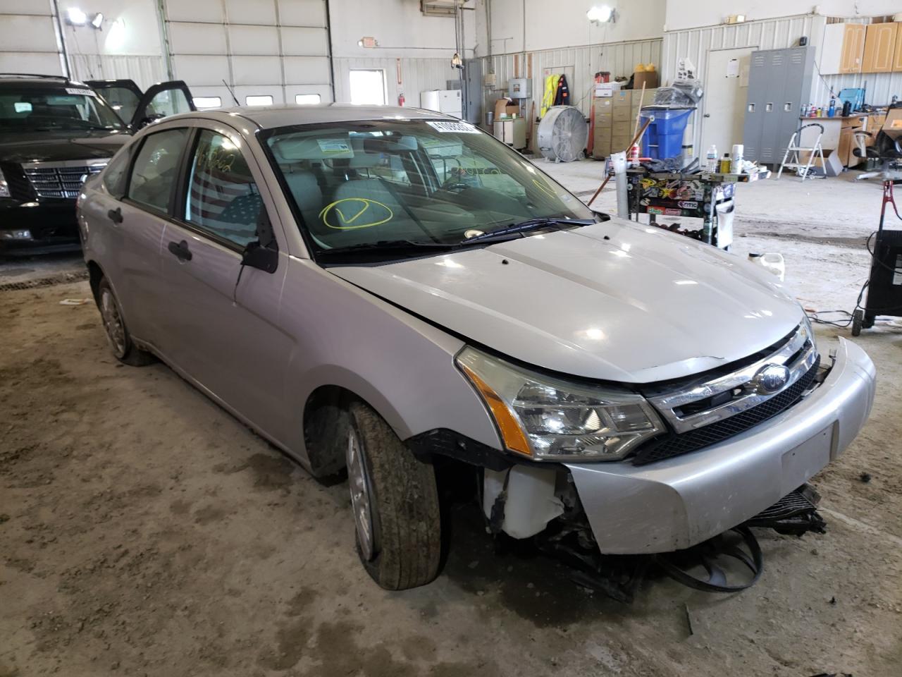 FORD FOCUS SE 2010 with VIN 1FAHP3FN0AW169023 - Photo from auction