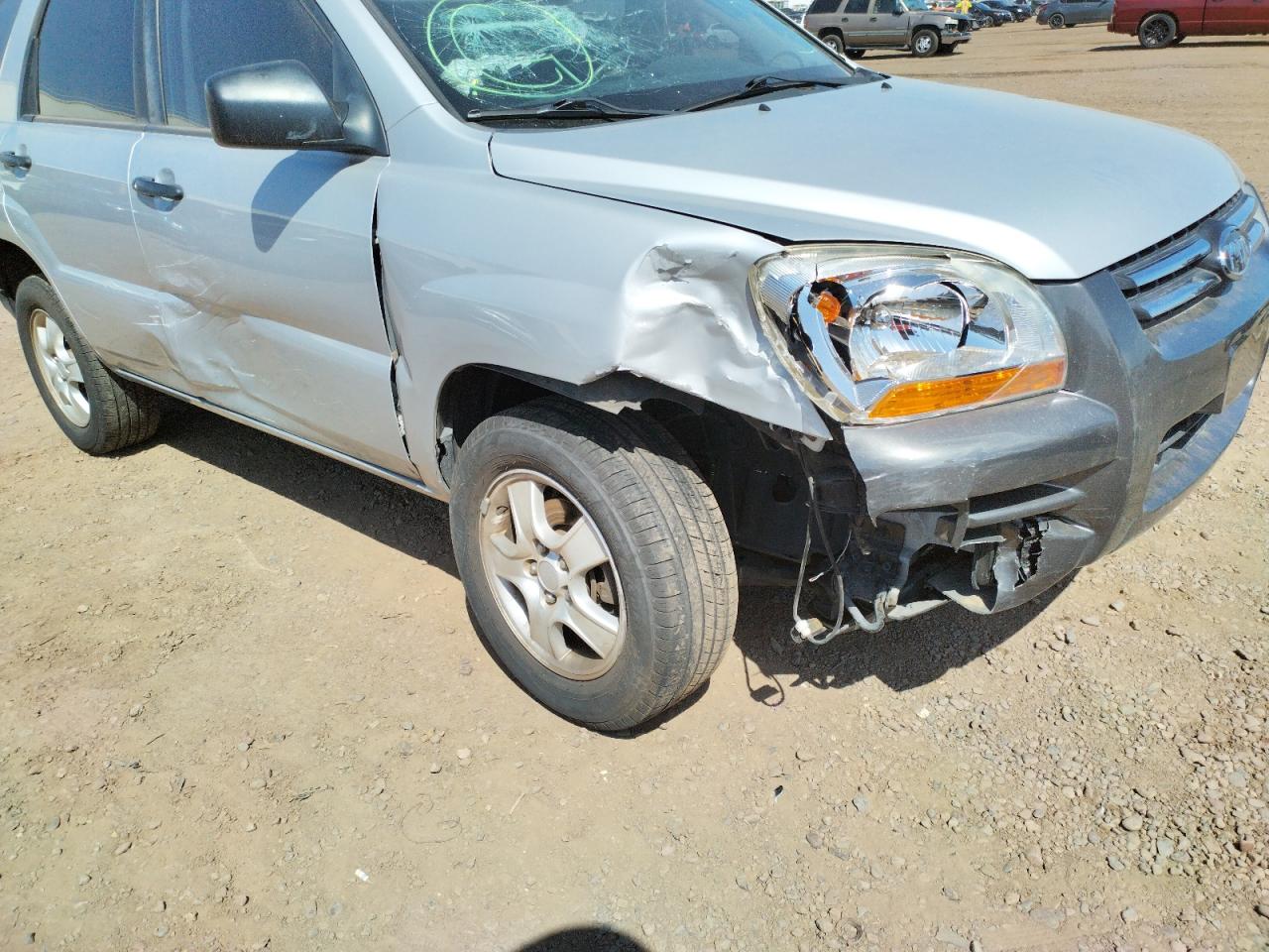 Photo 9 from auction – 2007 KIA SPORTAGE L with VIN KNDJF724X77376976