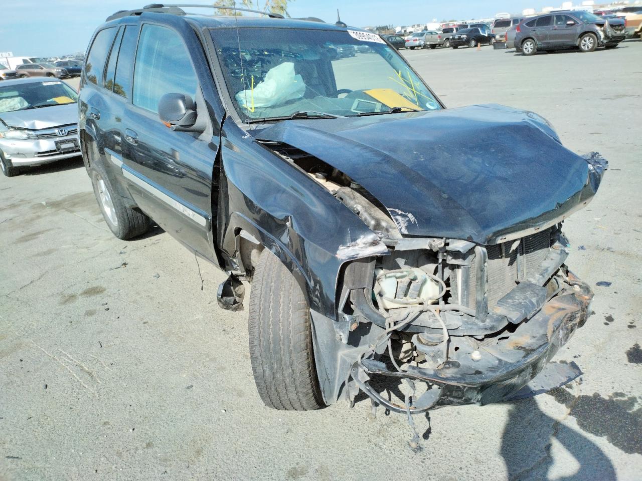 Photo 9 from auction – 2004 GMC ENVOY with VIN 1GKDT13S042309378