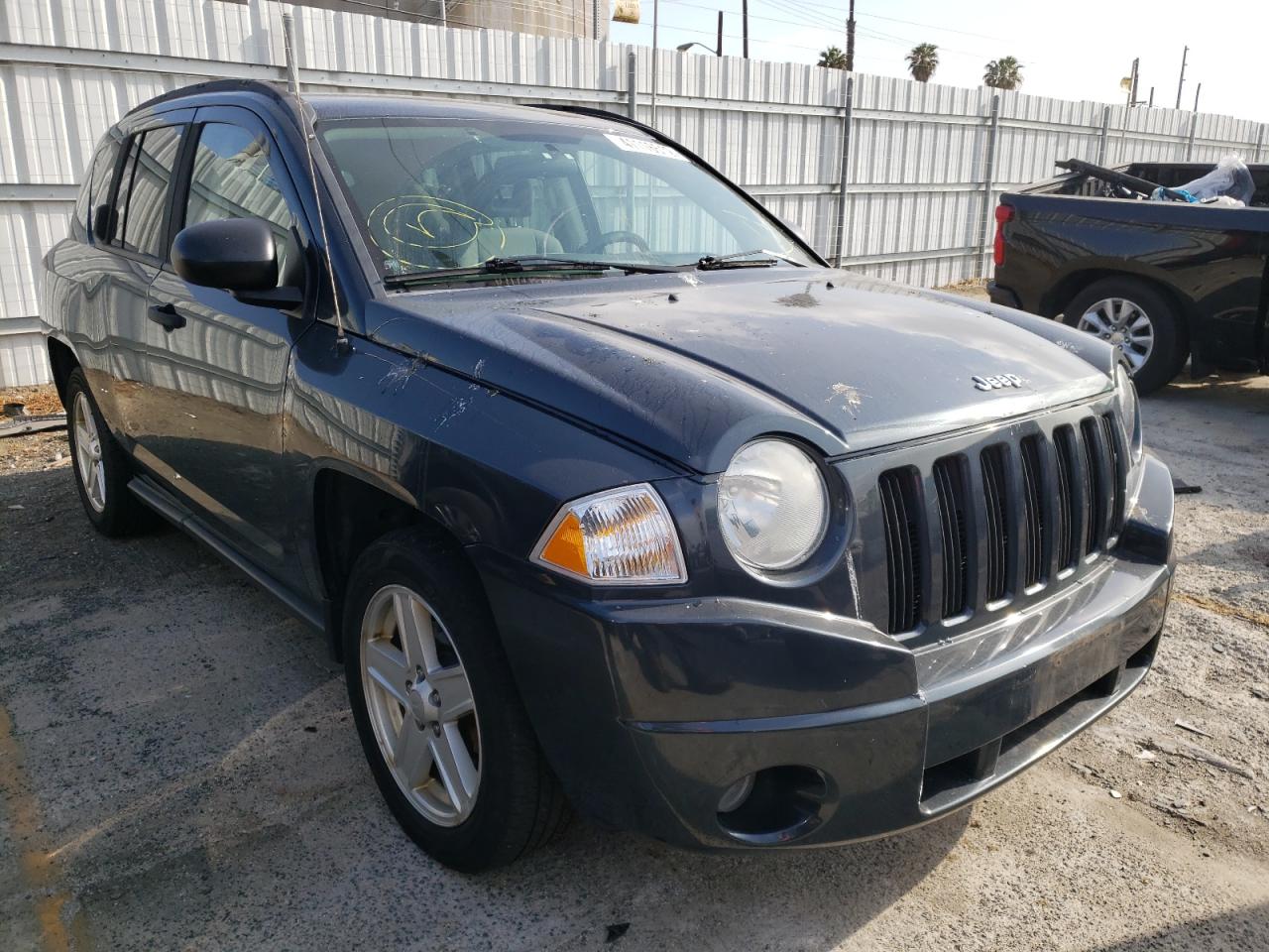 JEEP COMPASS 2007 with VIN 1J8FF47W77D170961 - Photo from auction