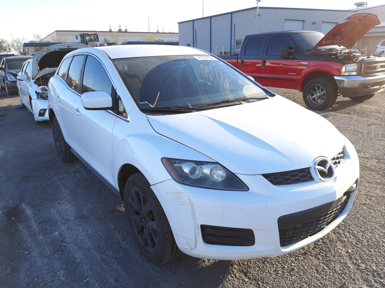 MAZDA CX-7 2009 with VIN JM3ER29LX90225616 - Photo from auction