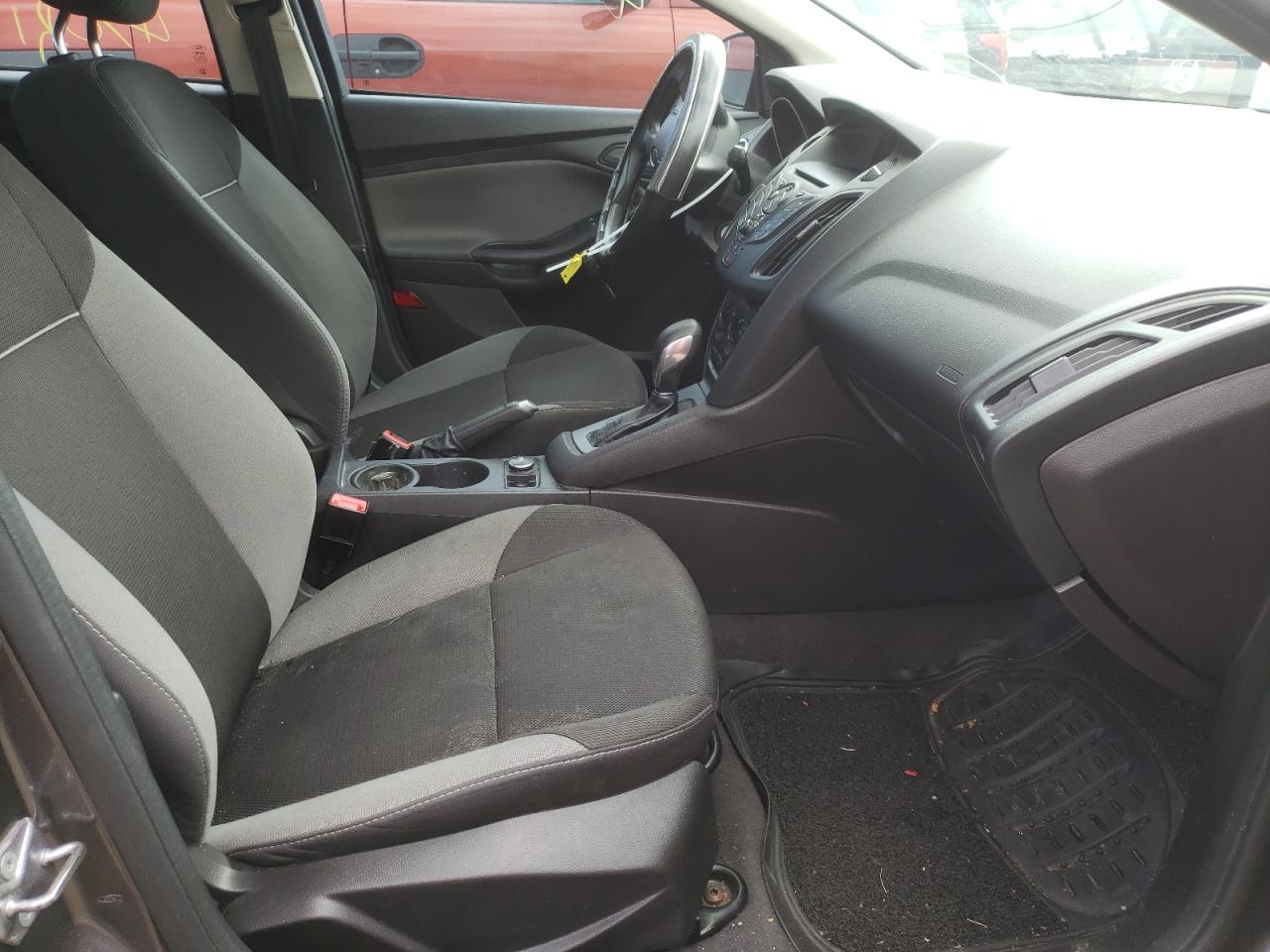 Photo 5 from auction – 2014 FORD FOCUS S with VIN 1FADP3E26EL358935