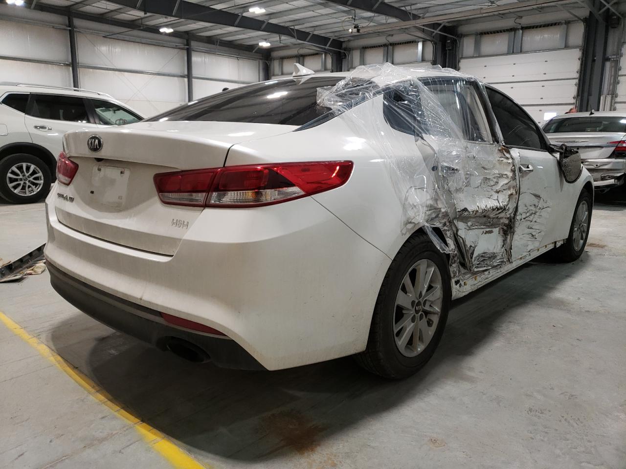 Photo 4 from auction – 2016 KIA OPTIMA LX with VIN KNAGT4L33G5086739