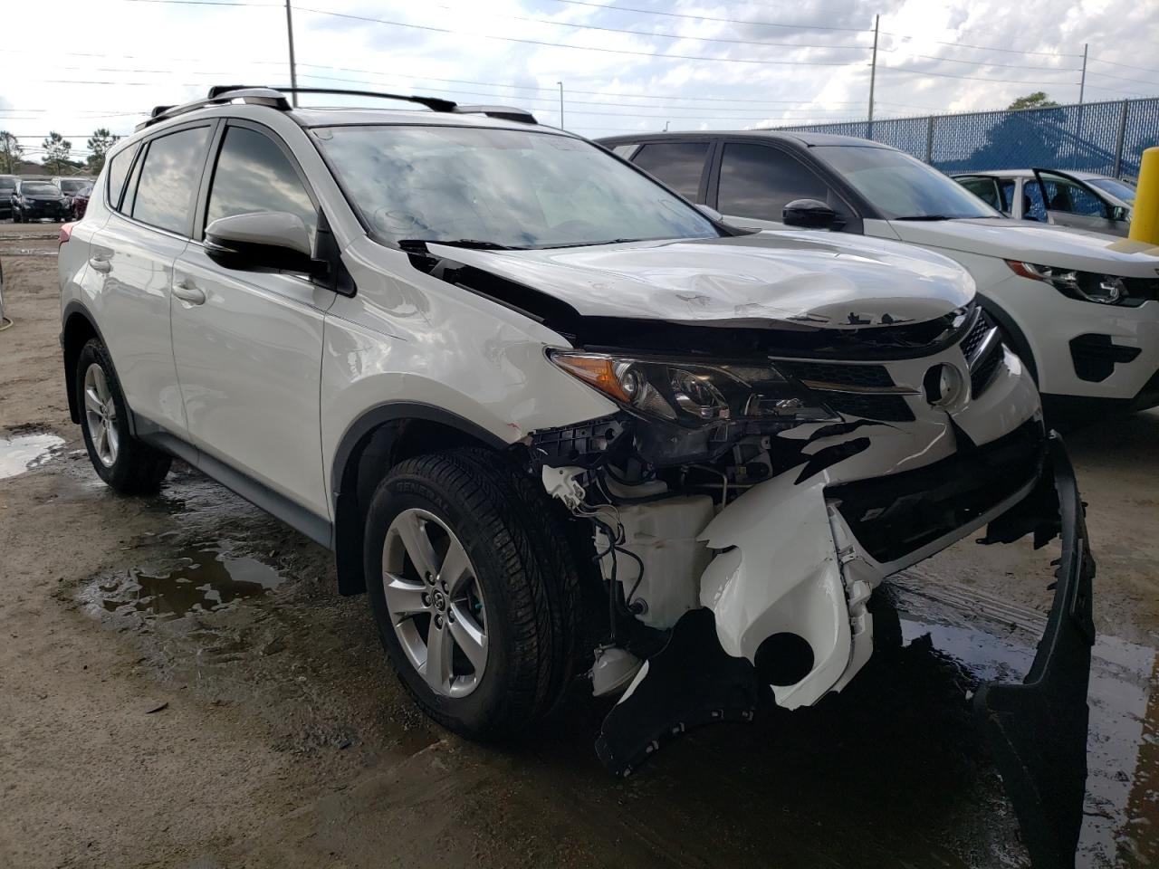 TOYOTA RAV4 XLE 2015 with VIN JTMWFREV1FJ045677 - Photo from auction