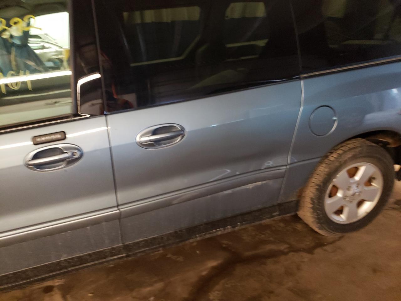 Photo 9 from auction – 2004 FORD FREESTAR S with VIN 2FMDA57604BA55747