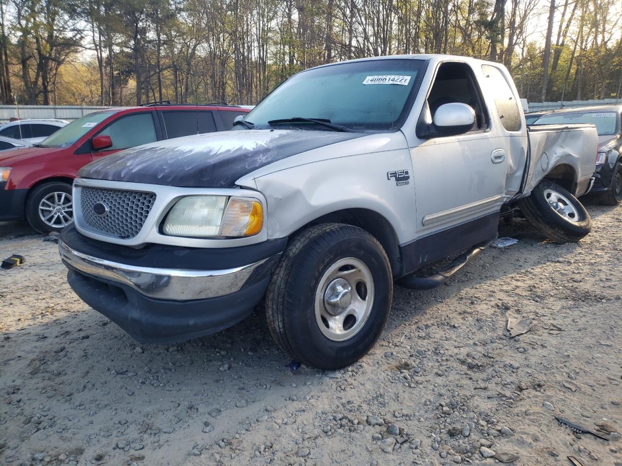 Photo 2 from auction – 1999 FORD F150 with VIN 1FTRX17WXXNB73749
