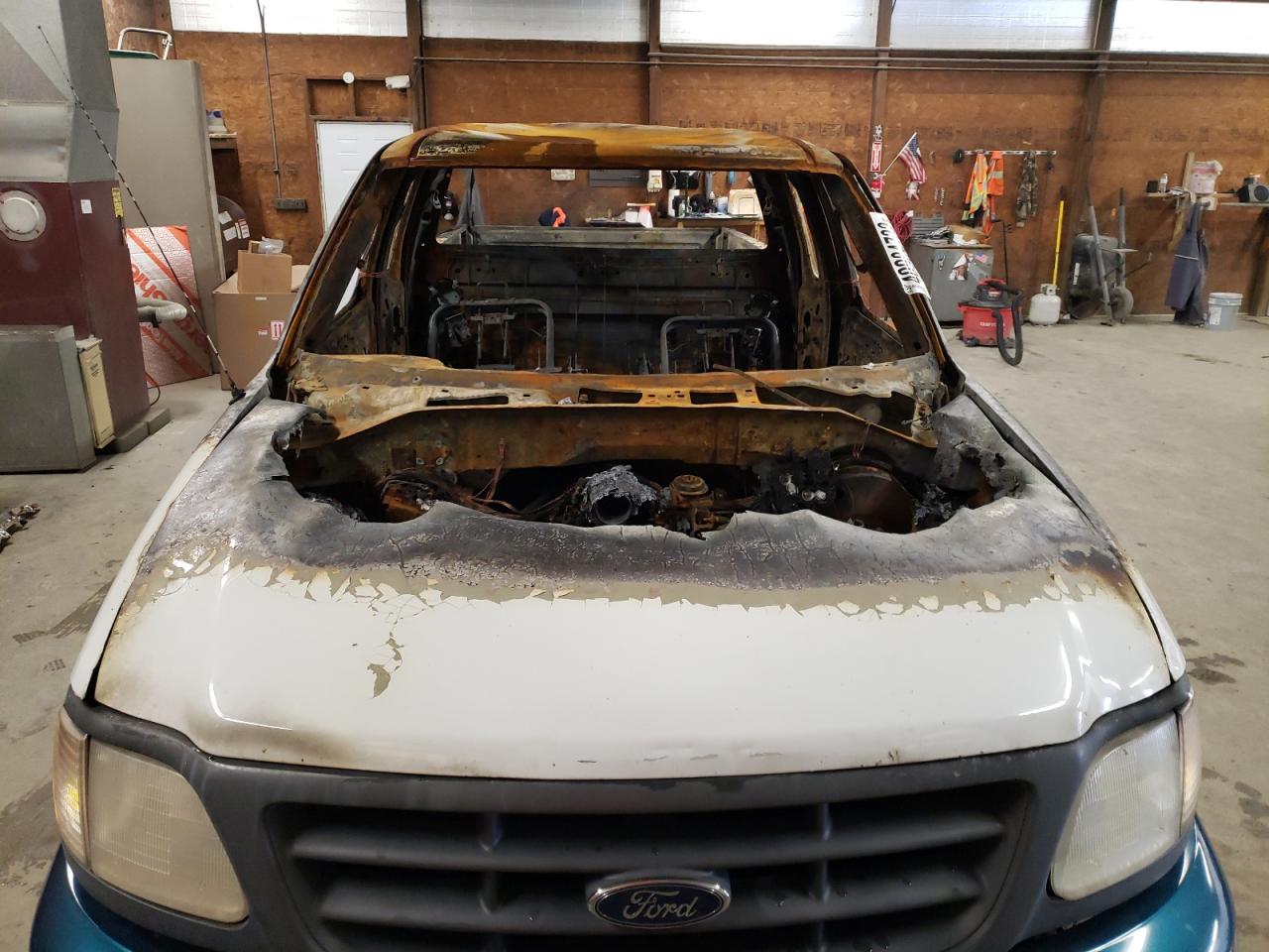 Photo 9 from auction – 2002 FORD F150 with VIN 2FTRX18L42CA39726