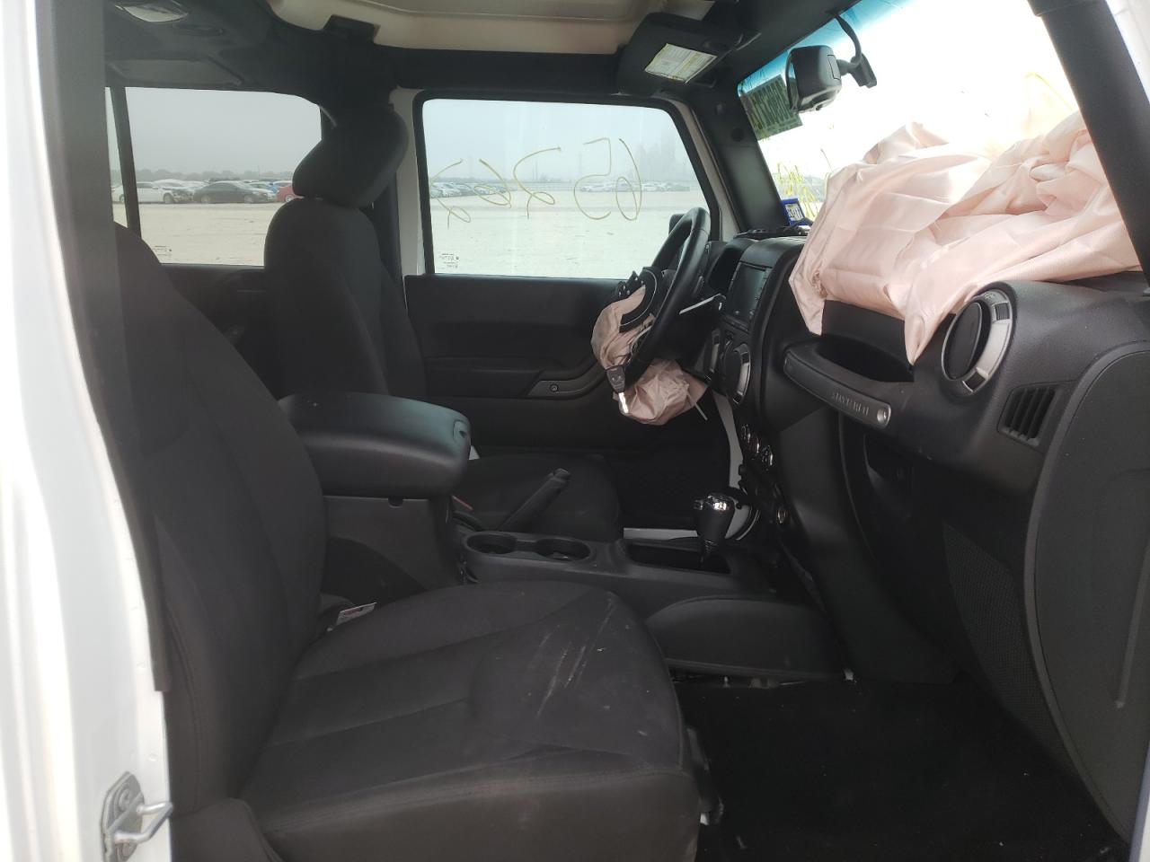 Photo 5 from auction – 2016 JEEP WRANGLER U with VIN 1C4HJWDG8GL303790