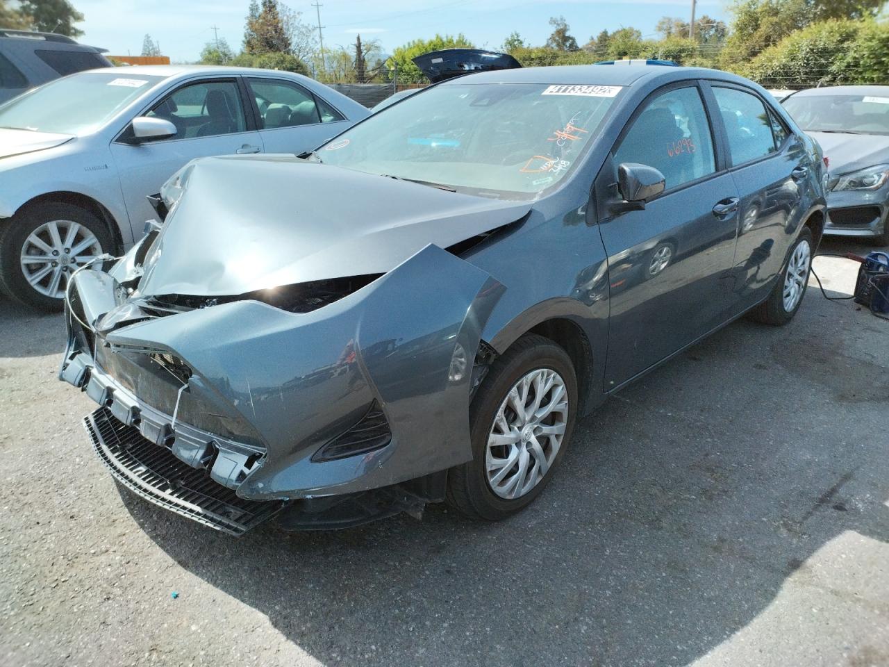 Photo 2 from auction – 2018 TOYOTA COROLLA L with VIN 5YFBURHEXJP830557