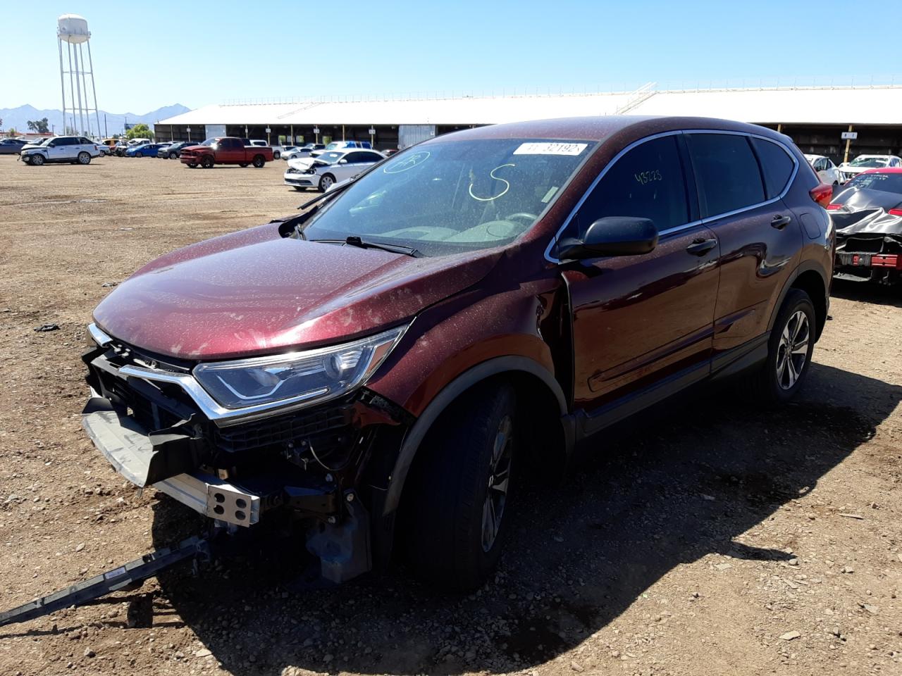 Photo 2 from auction – 2017 HONDA CR-V LX with VIN 7FARW5H31HE014623