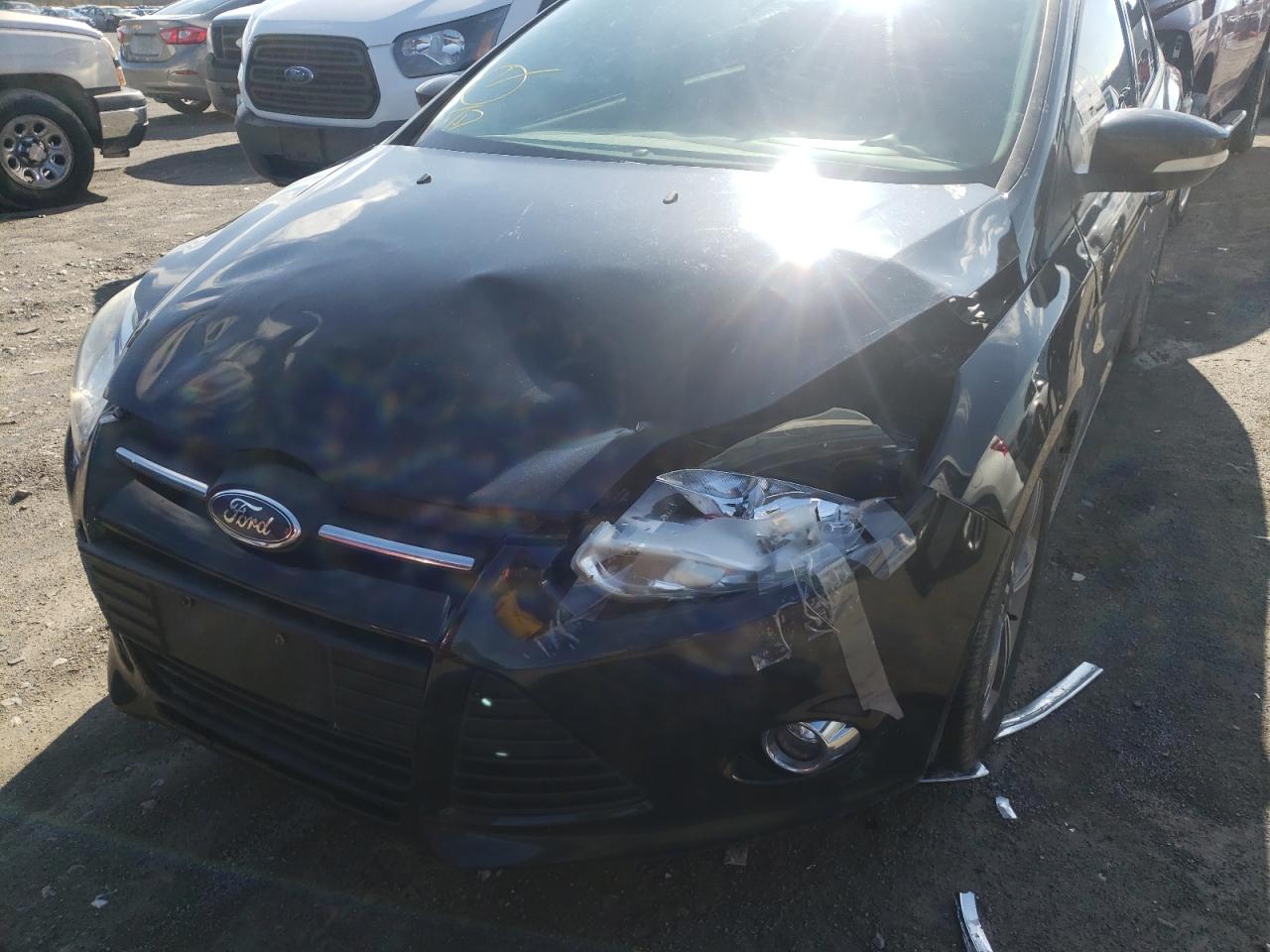 Photo 9 from auction – 2014 FORD FOCUS SE with VIN 1FADP3F25EL321177