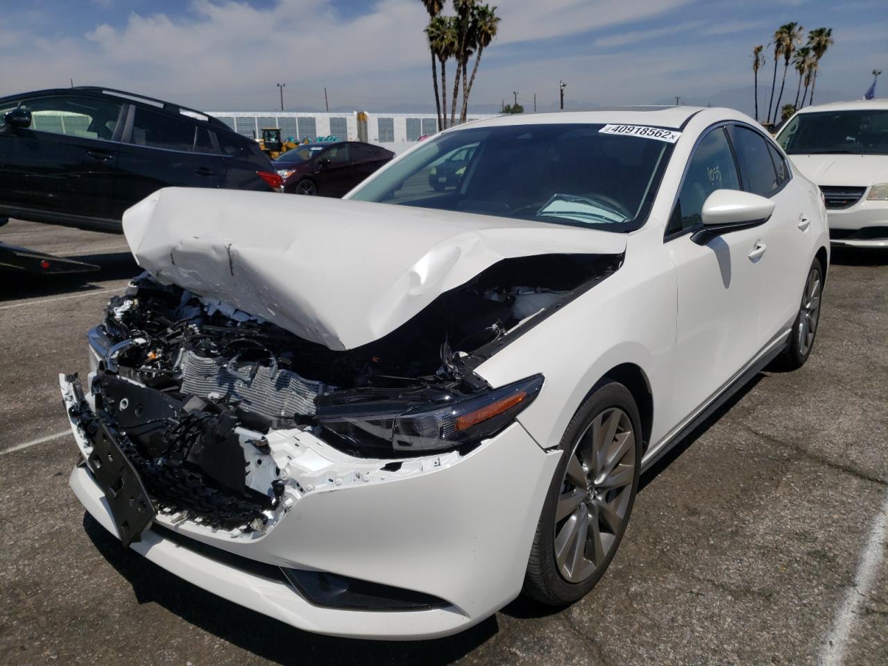 Photo 2 from auction – 2022 MAZDA 3 PREMIUM with VIN JM1BPBDL9N1507520