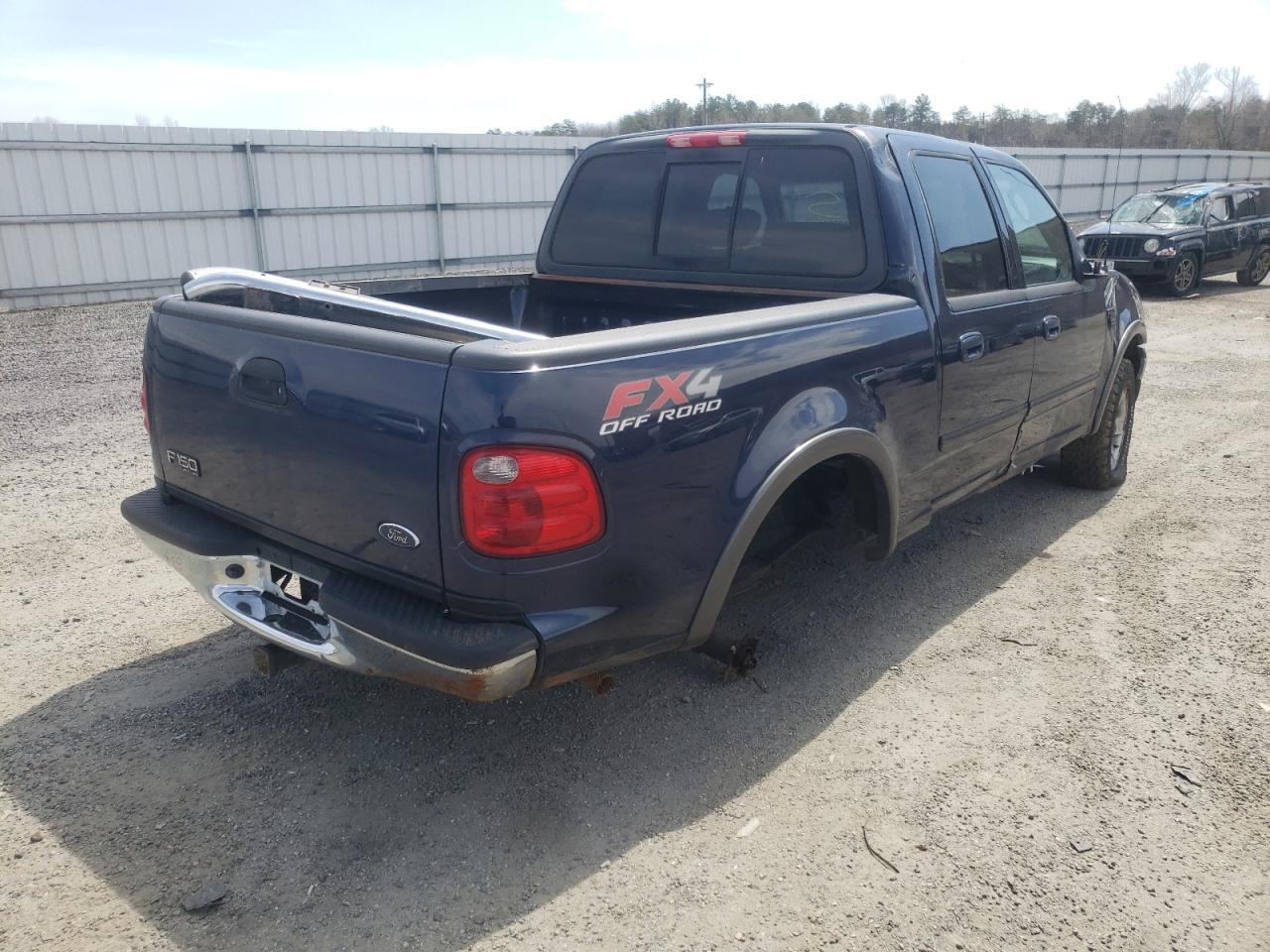 Photo 4 from auction – 2003 FORD F150 SUPER with VIN 1FTRW08L03KB31409