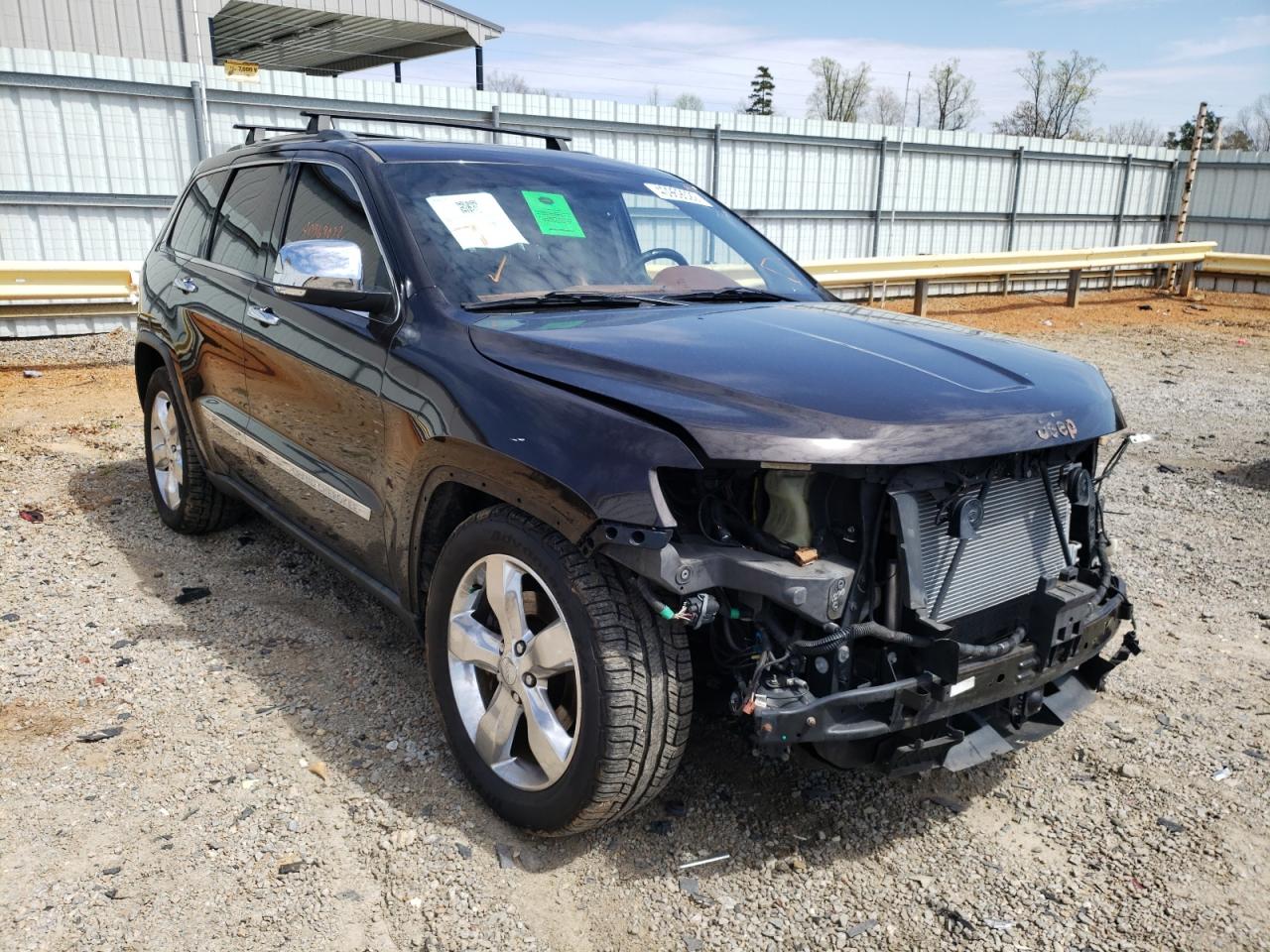 JEEP GRAND CHER 2011 with VIN 1J4RR6GT0BC701715 - Photo from auction