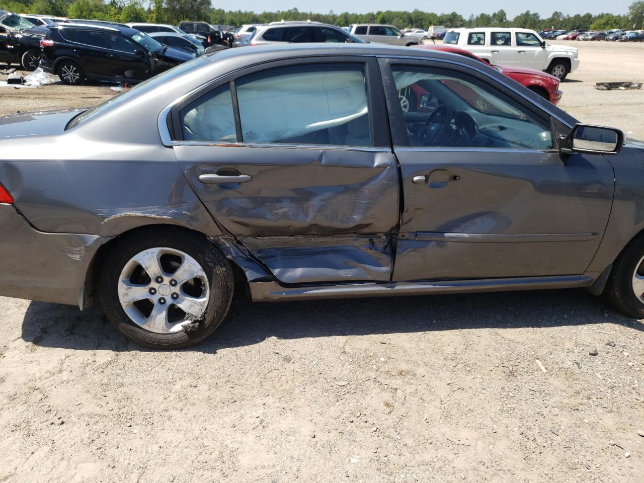 Photo 9 from auction – 2009 KIA OPTIMA LX with VIN KNAGE228495299746