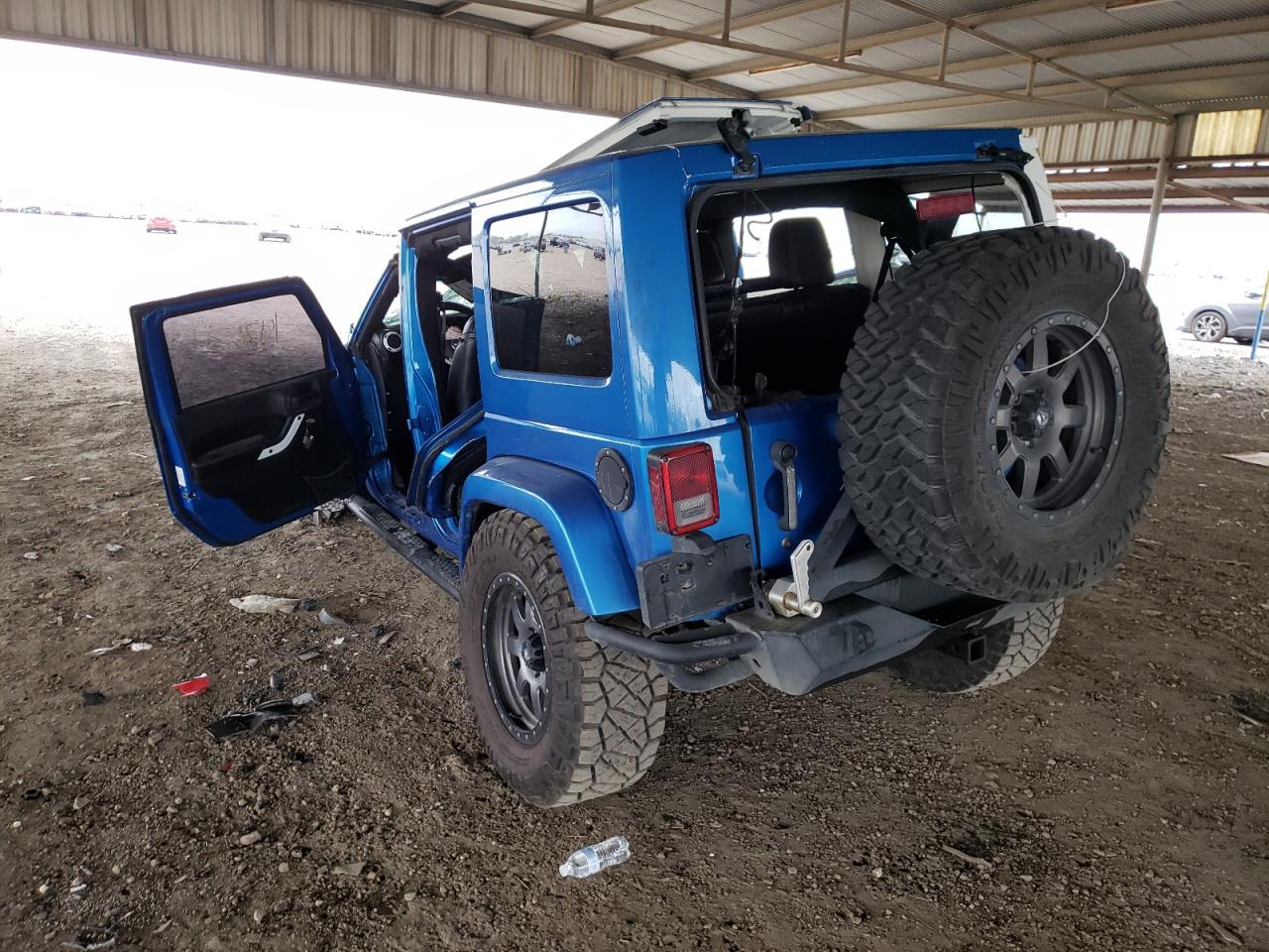 Photo 3 from auction – 2014 JEEP WRANGLER U with VIN 1C4HJWEG8EL182058