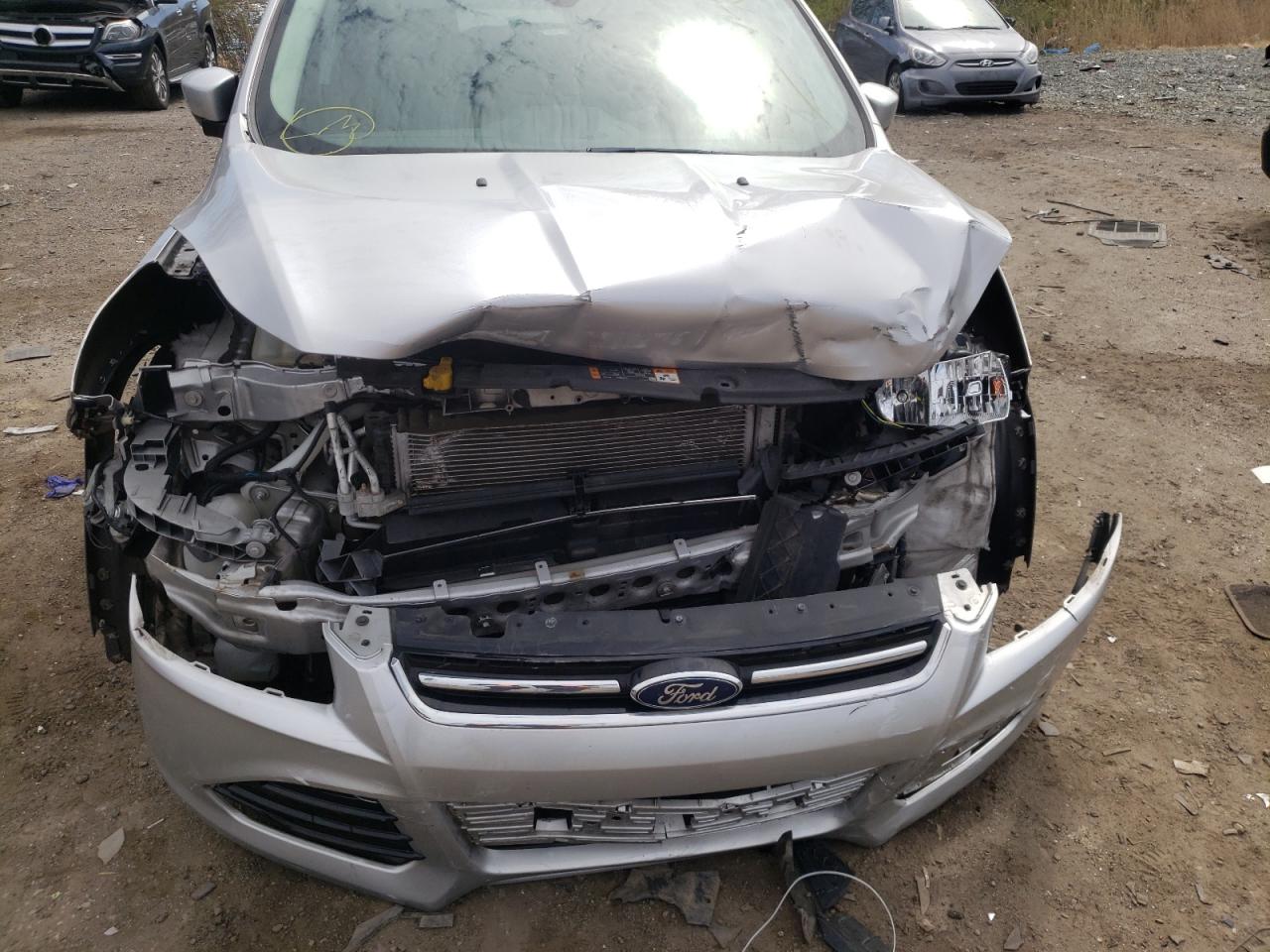 Photo 9 from auction – 2016 FORD ESCAPE TIT with VIN 1FMCU9JXXGUB85531