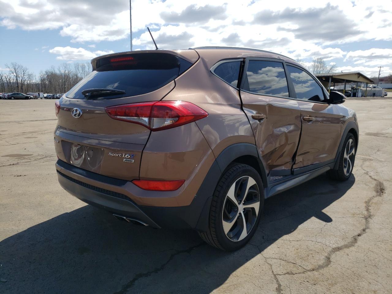 Photo 4 from auction – 2016 HYUNDAI TUCSON LIM with VIN KM8J3CA28GU160560