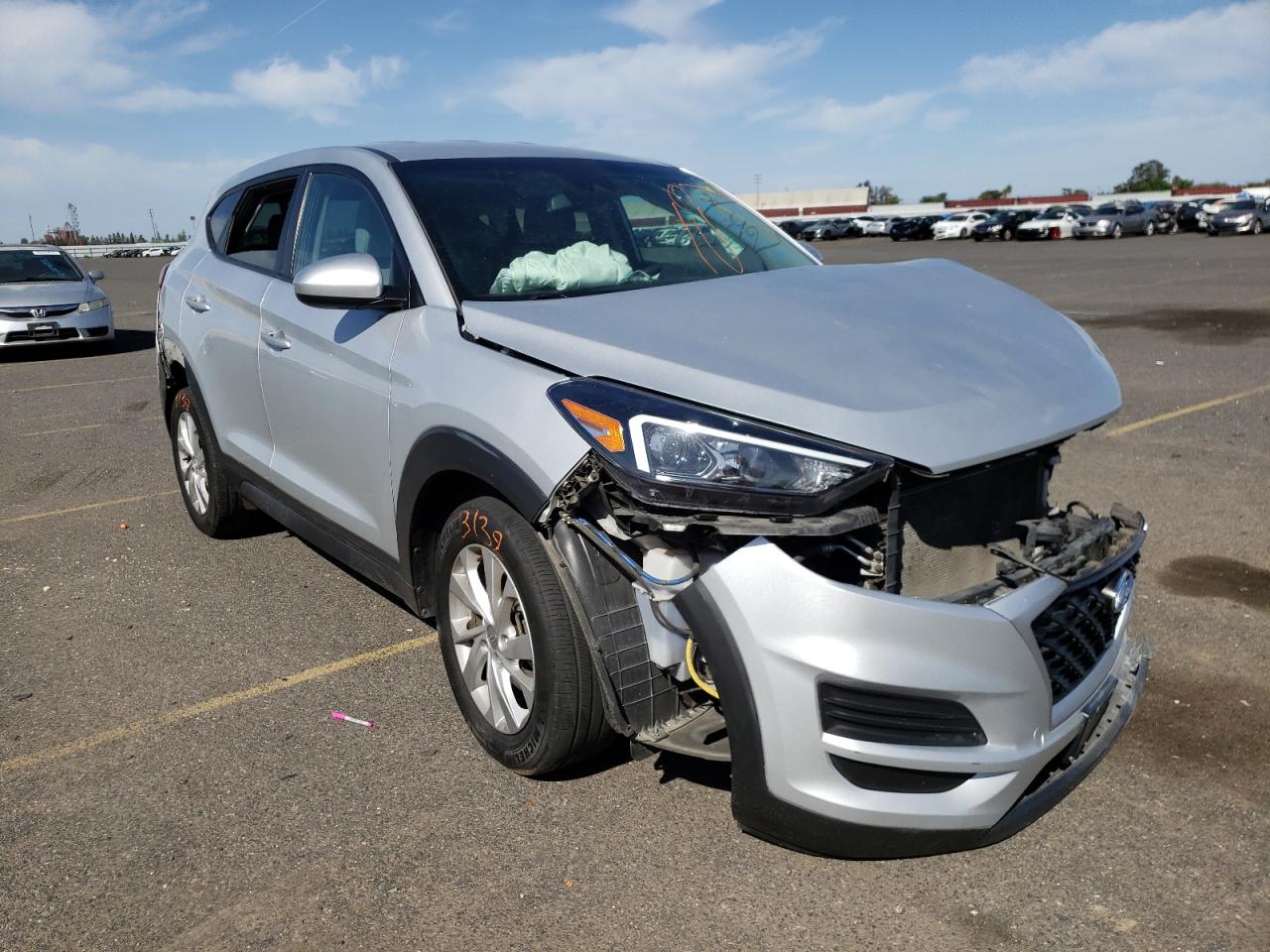 HYUNDAI TUCSON SE 2019 with VIN KM8J2CA4XKU889186 - Photo from auction