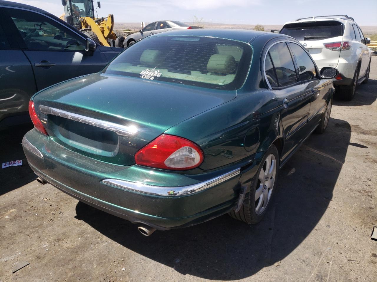 Photo 4 from auction – 2004 JAGUAR X-TYPE 3.0 with VIN SAJEA51C14WD74911