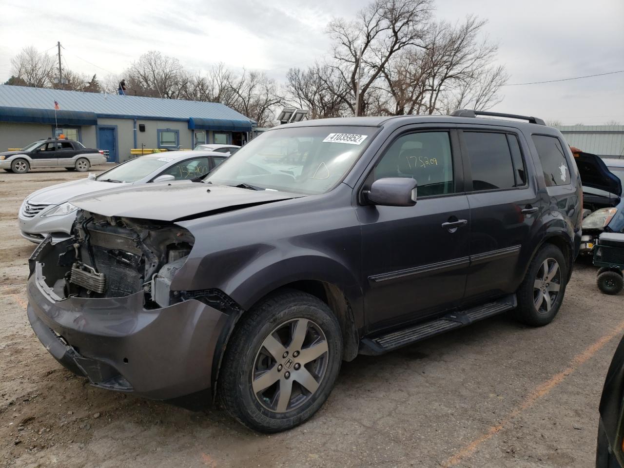 Photo 2 from auction – 2015 HONDA PILOT TOUR with VIN 5FNYF4H91FB069639
