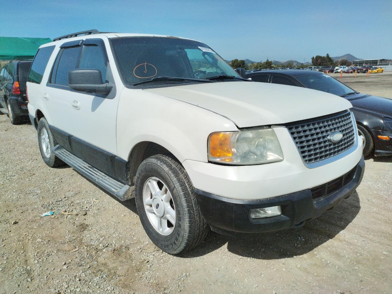 Foto 9 de la subasta – 2005 FORD EXPEDITION con VIN 1FMPU16505LB06719