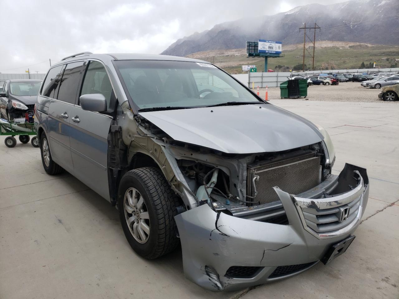 HONDA ODYSSEY EX 2010 with VIN 5FNRL3H49AB097371 - Photo from auction