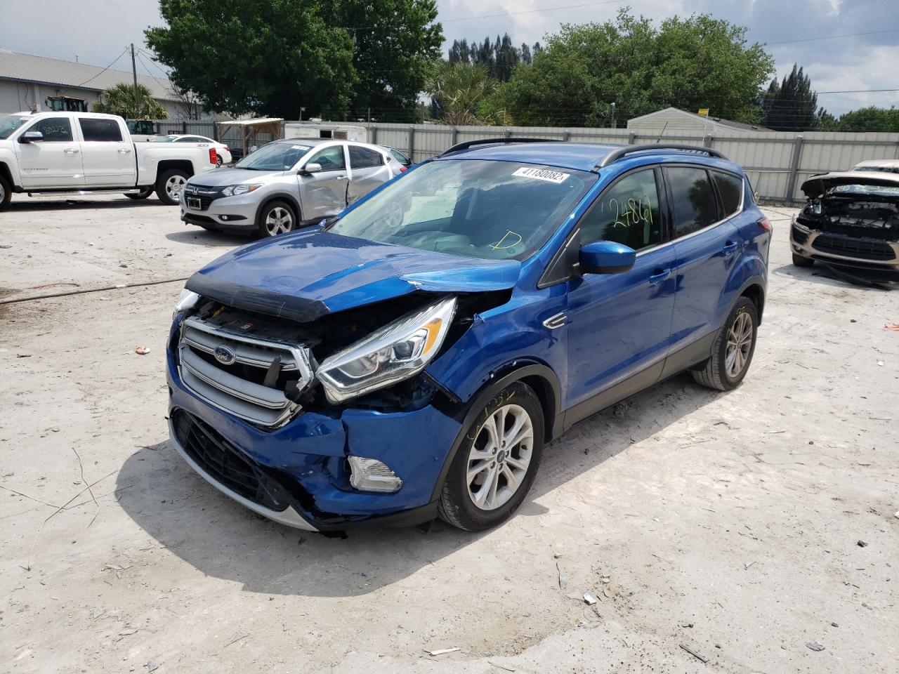 Photo 2 from auction – 2017 FORD ESCAPE SE with VIN 1FMCU0GD3HUC60208