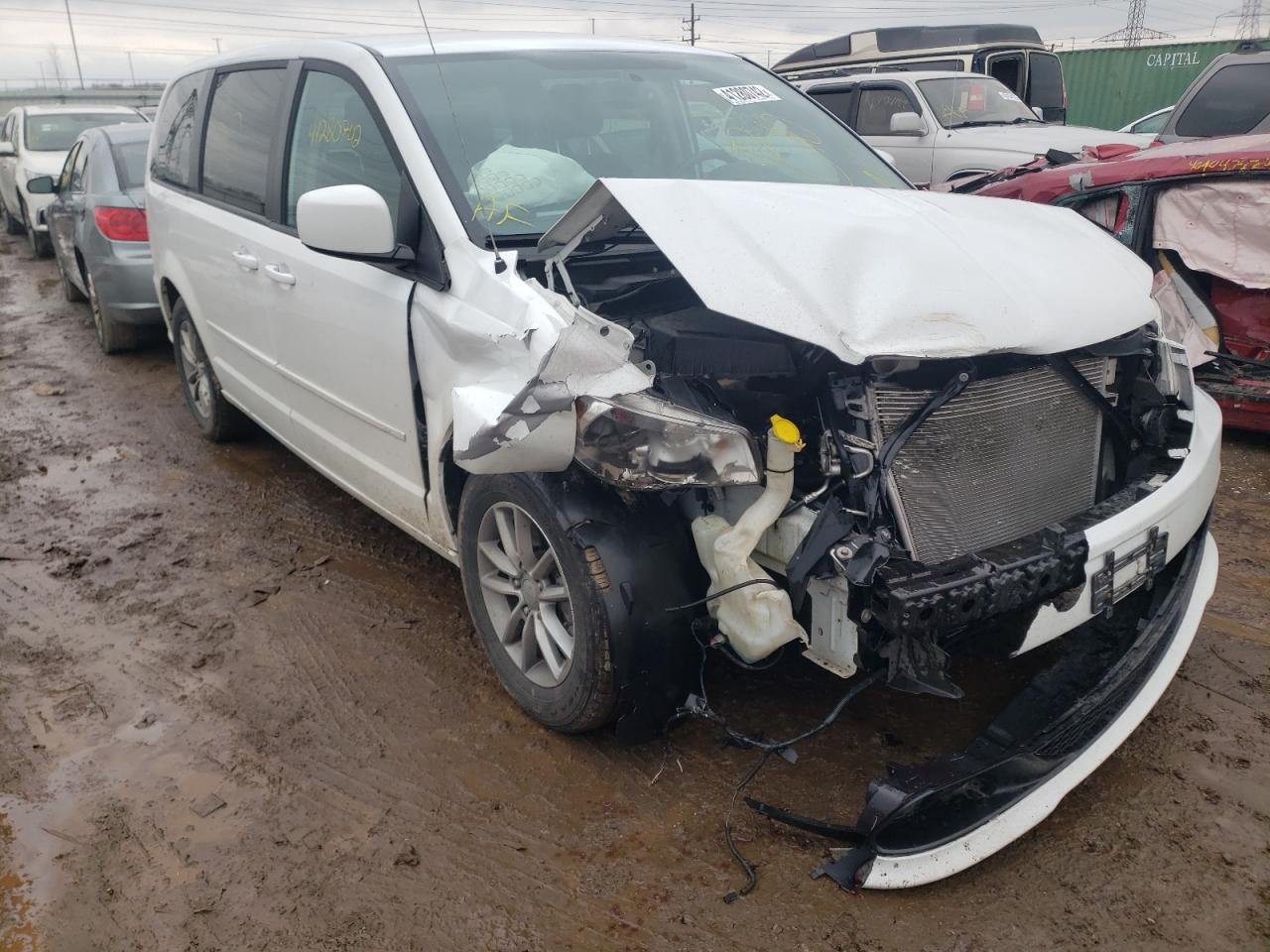 DODGE GRAND CARA 2016 con VIN 2C4RDGBG1GR243671 - Foto de la subasta