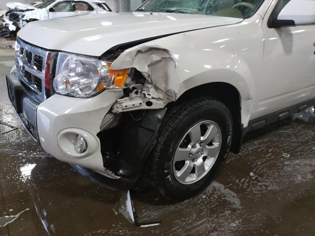 Photo 9 from auction – 2010 FORD ESCAPE LIM with VIN 1FMCU9EG3AKD10141