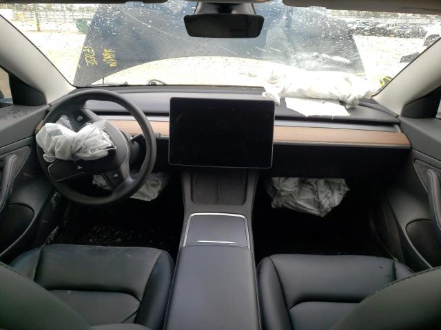 Photo 9 from auction – 2021 TESLA MODEL 3 with VIN 5YJ3E1EA3MF853974