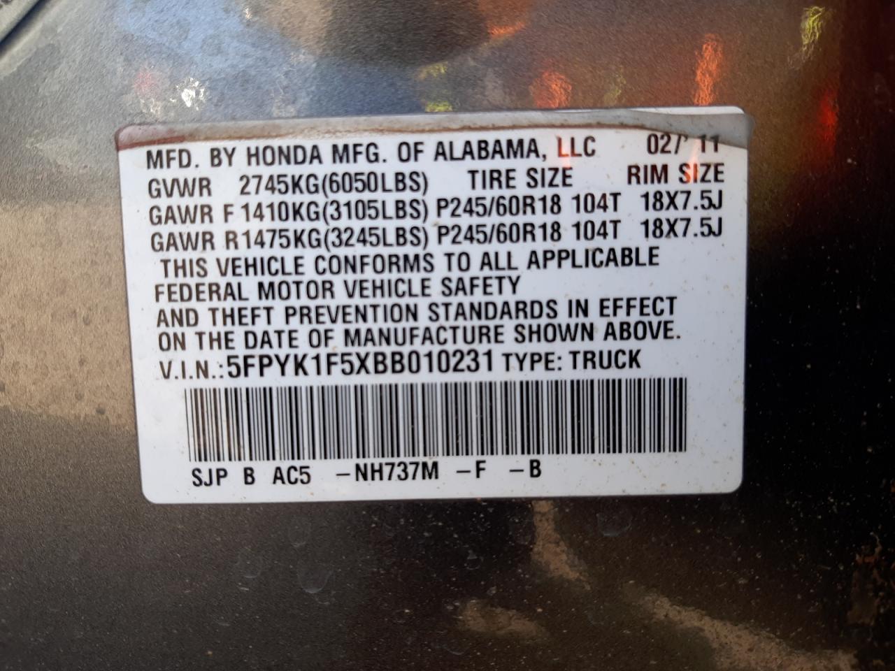 Photo 10 from auction – 2011 HONDA RIDGELINE with VIN 5FPYK1F5XBB010231