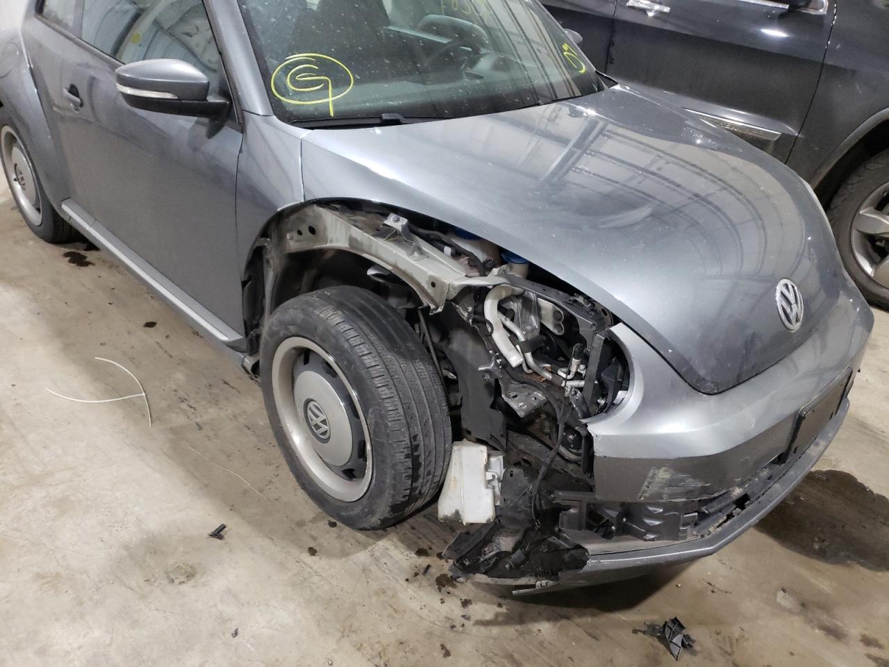 Photo 9 from auction – 2012 VOLKSWAGEN BEETLE with VIN 3VWJP7AT2CM627394