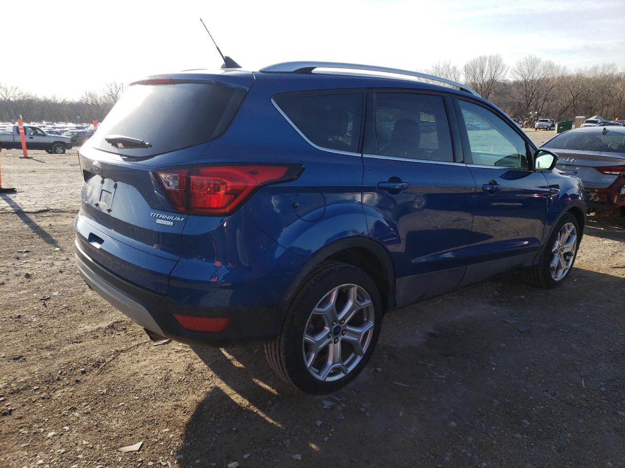 Photo 4 from auction – 2019 FORD ESCAPE TIT with VIN 1FMCU0J99KUC31825