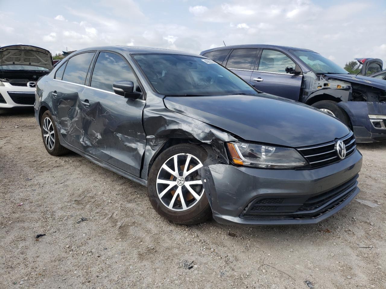 VOLKSWAGEN JETTA SE 2017 with VIN 3VWDB7AJ0HM289298 - Photo from auction