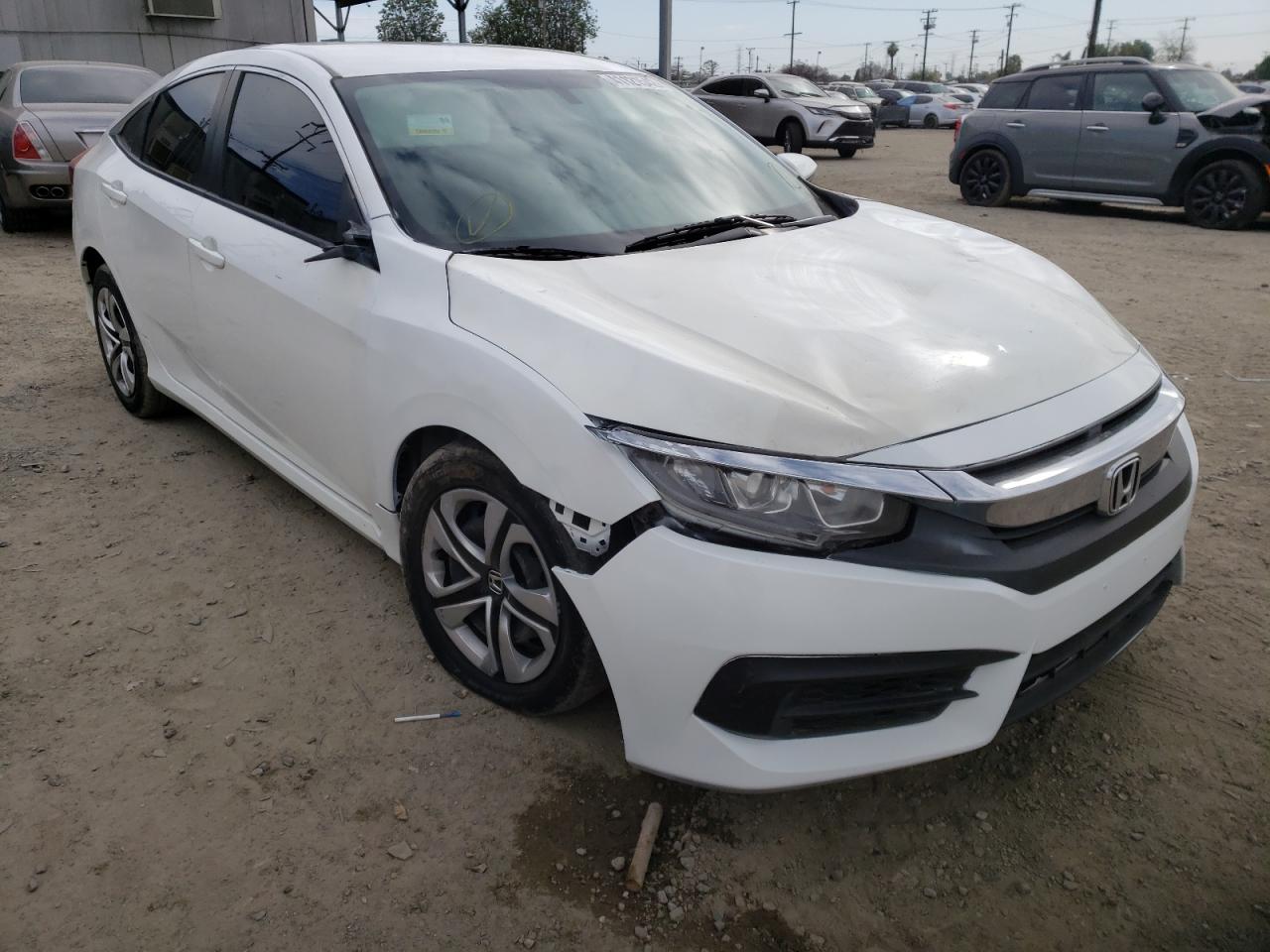 HONDA CIVIC LX 2018 with VIN 2HGFC2F57JH541125 - Photo from auction
