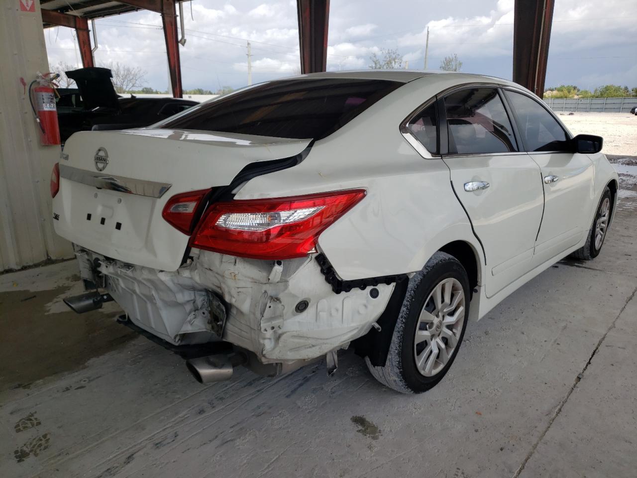 Photo 4 from auction – 2016 NISSAN ALTIMA 2.5 with VIN 1N4AL3AP0GC262222