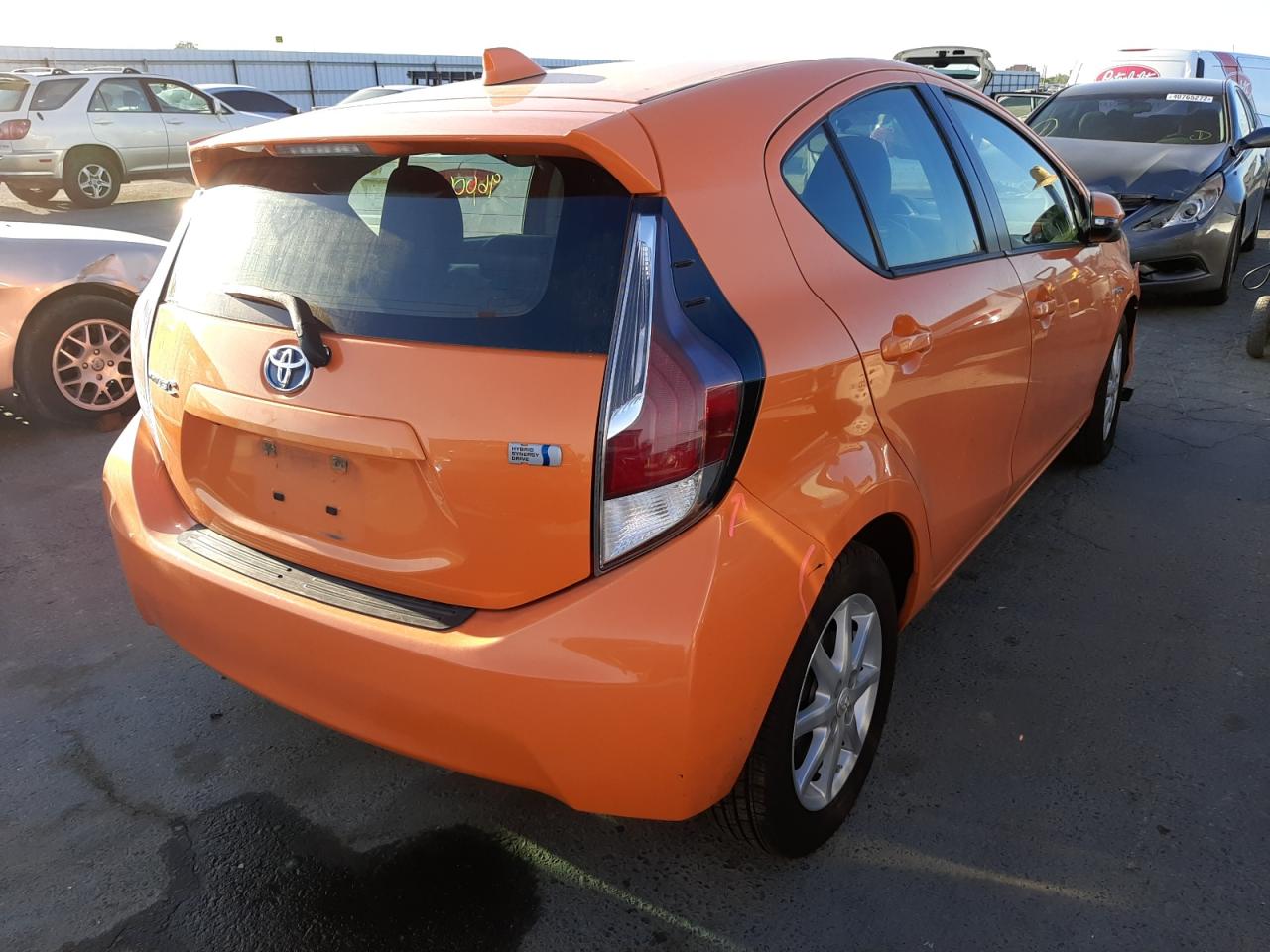 Photo 4 from auction – 2015 TOYOTA PRIUS C with VIN JTDKDTB34F1096823