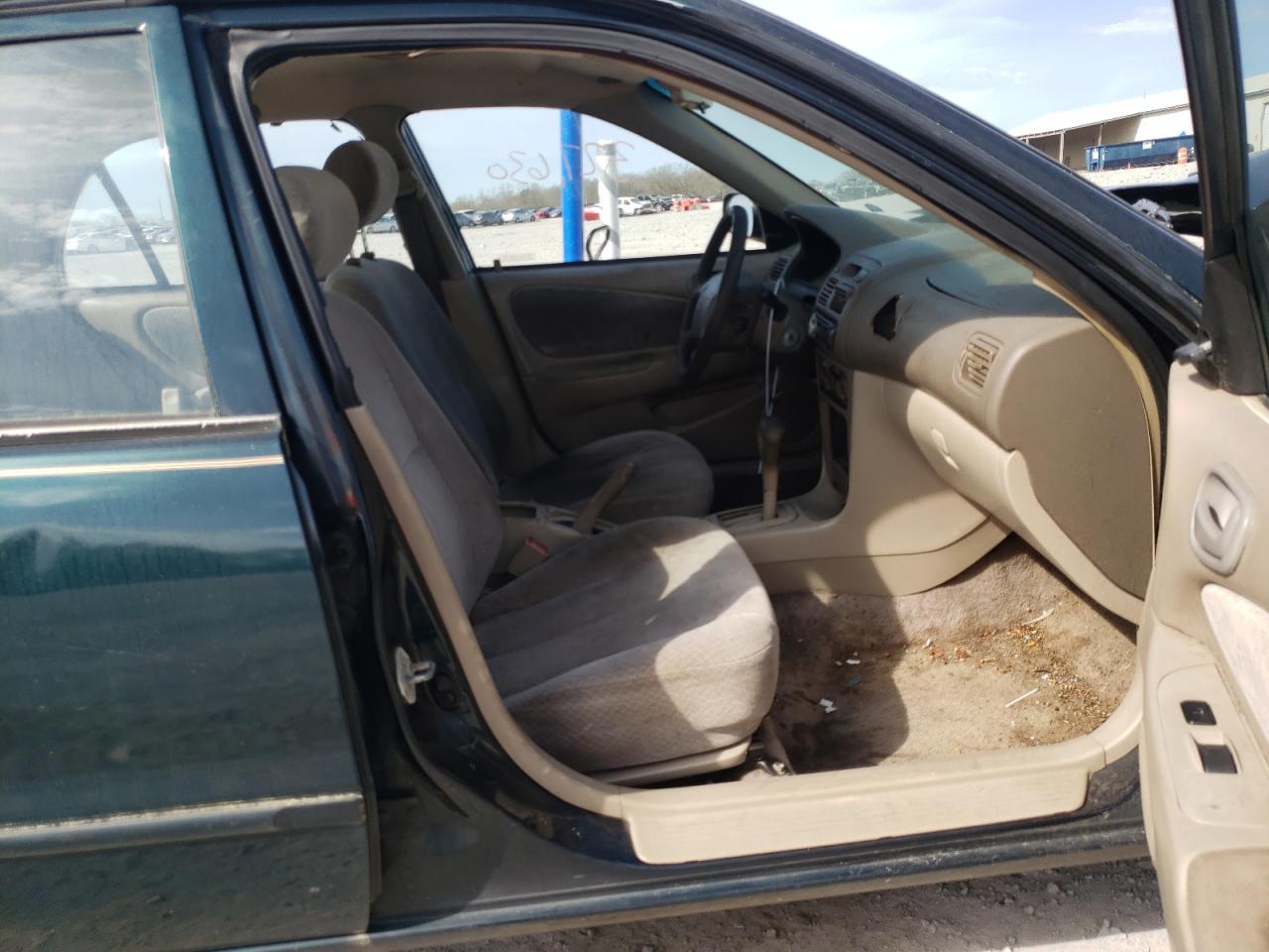 Photo 5 from auction – 1999 TOYOTA COROLLA VE with VIN 2T1BR12E6XC190576