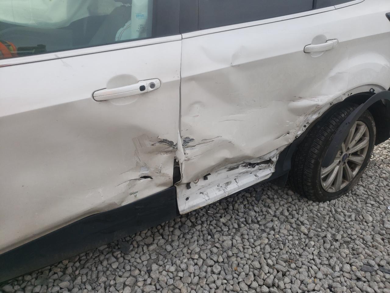 Photo 9 from auction – 2017 FORD ESCAPE TIT with VIN 1FMCU0J96HUB49060