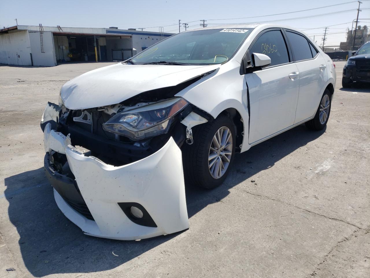Photo 2 from auction – 2014 TOYOTA COROLLA L with VIN 5YFBURHE6EP033843