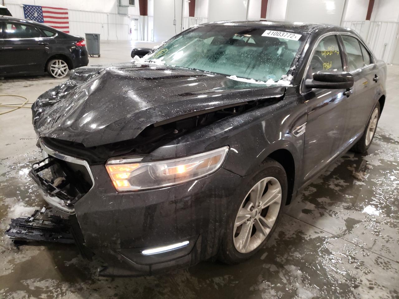 Photo 2 from auction – 2015 FORD TAURUS SEL with VIN 1FAHP2E8XFG114229