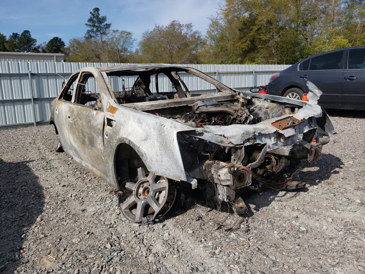CADILLAC STS 2010 with VIN 1G6DU6EV8A0101093 - Photo from auction